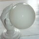 White ceramic hand wall light and white opaline globe, in perfect condition