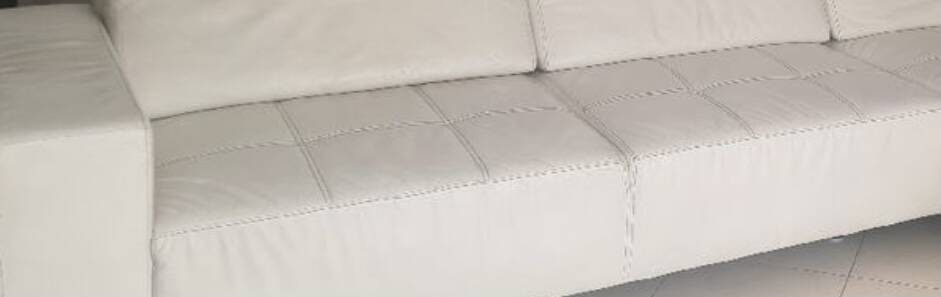 White leather corner sofa