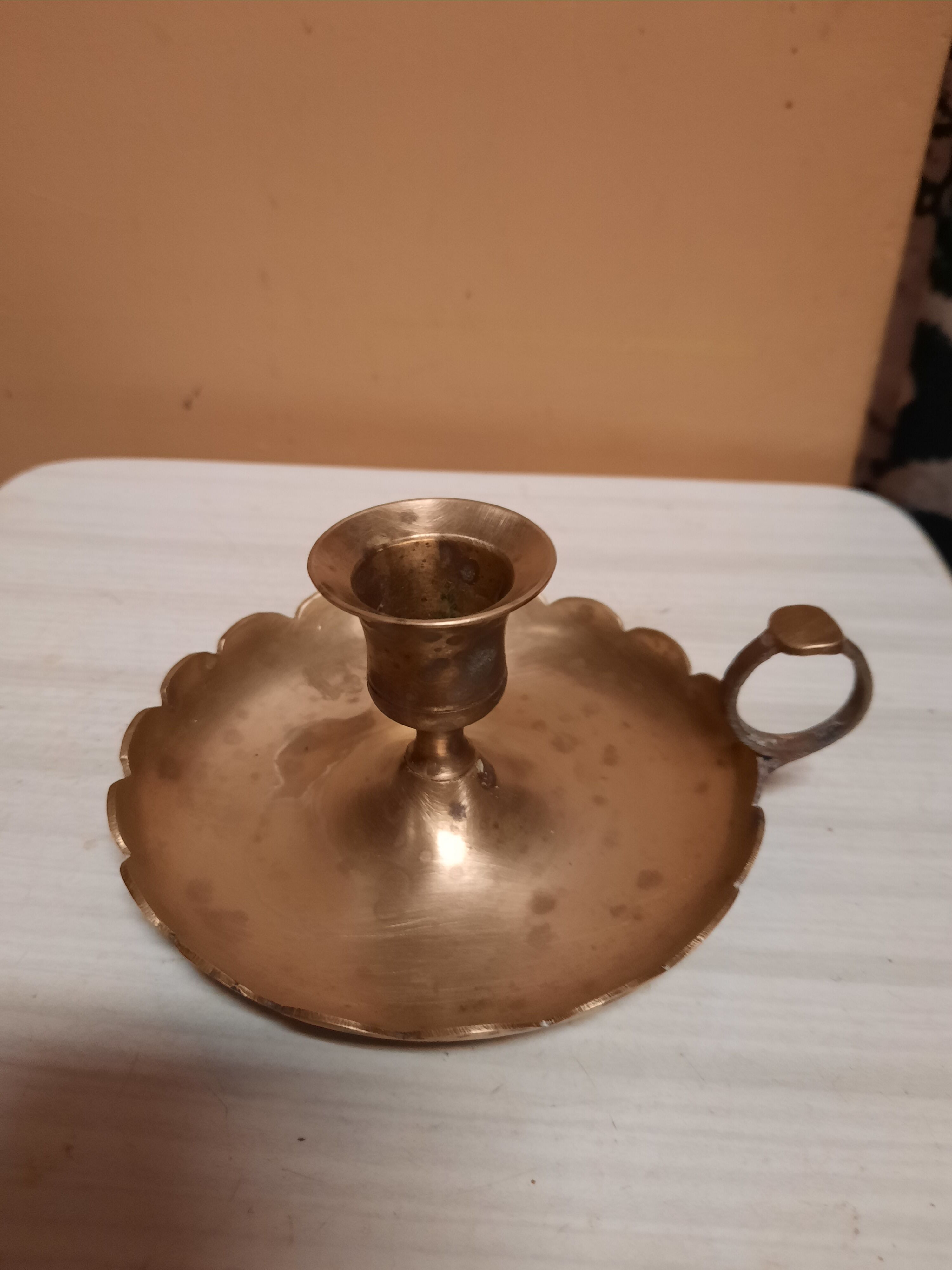 Golden hand candle holder