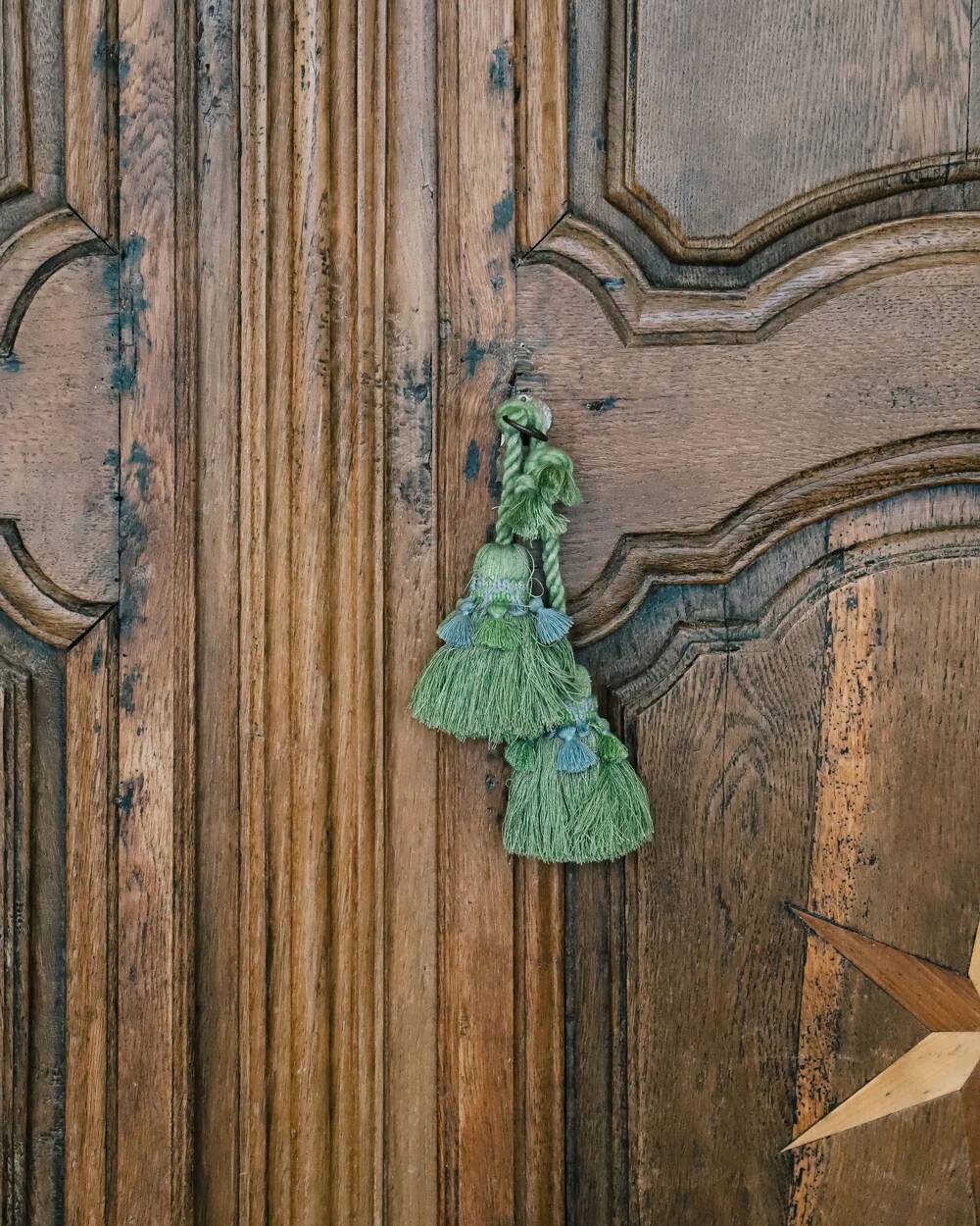 Antique French rustic wardrobe with star inlays.