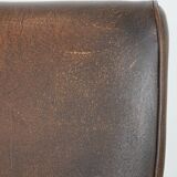 Set of two vintage sheepskin leather design armchairs in a cognac colour