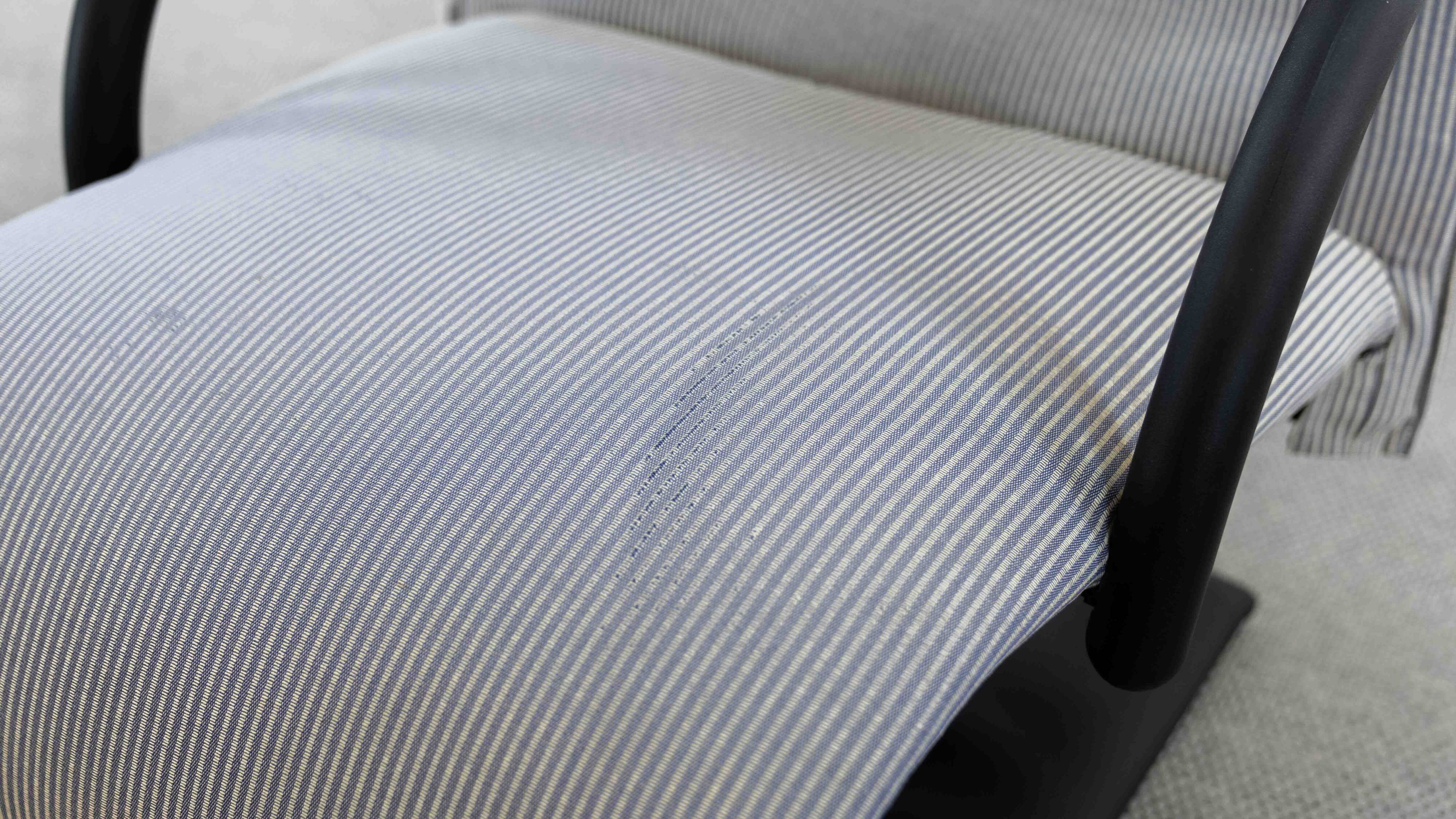 Zen easy chair with footrest by claude brisson for ligne roset