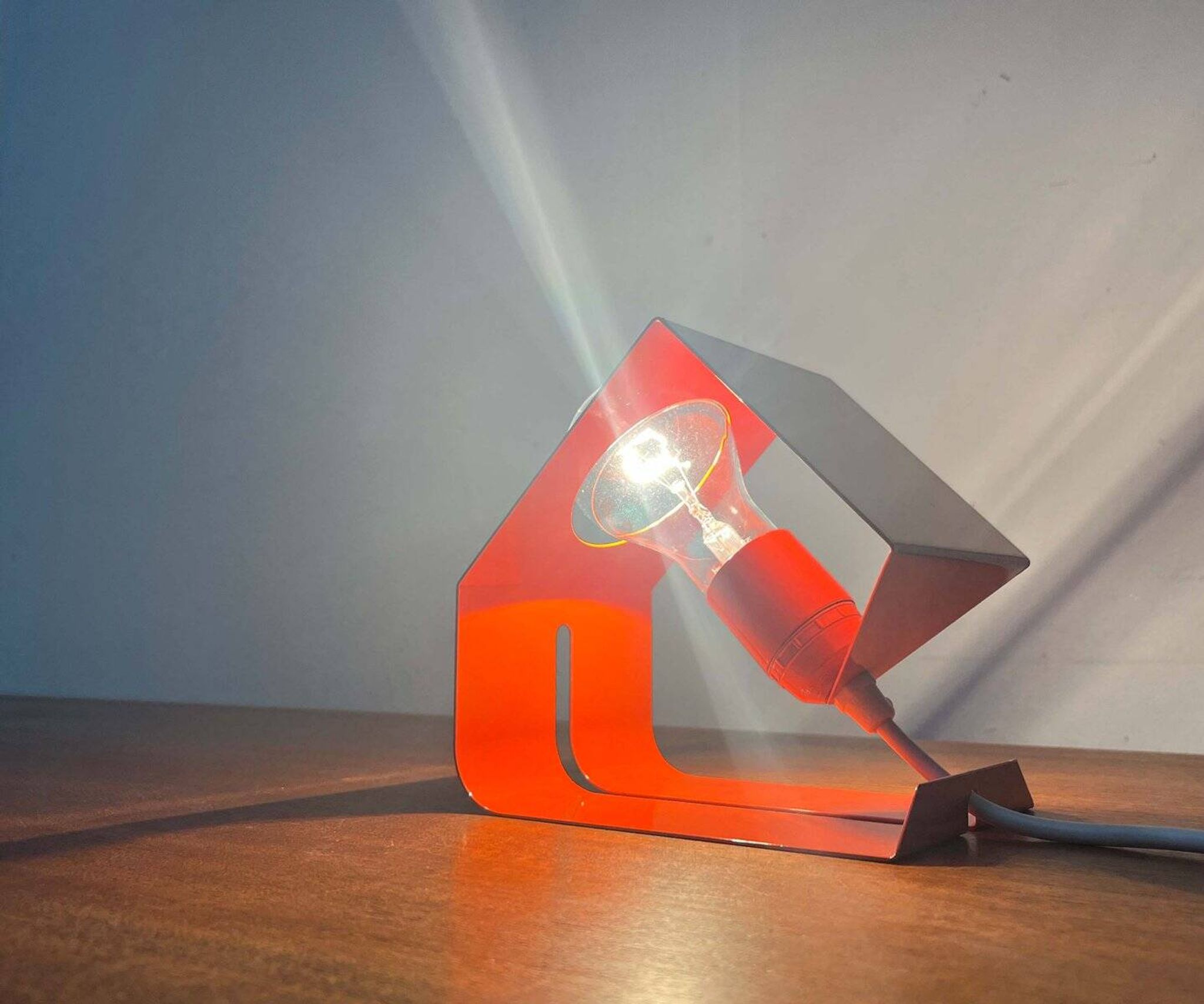 Orange metal table lamp, minimalist, modern mid-century space age, 1960s.