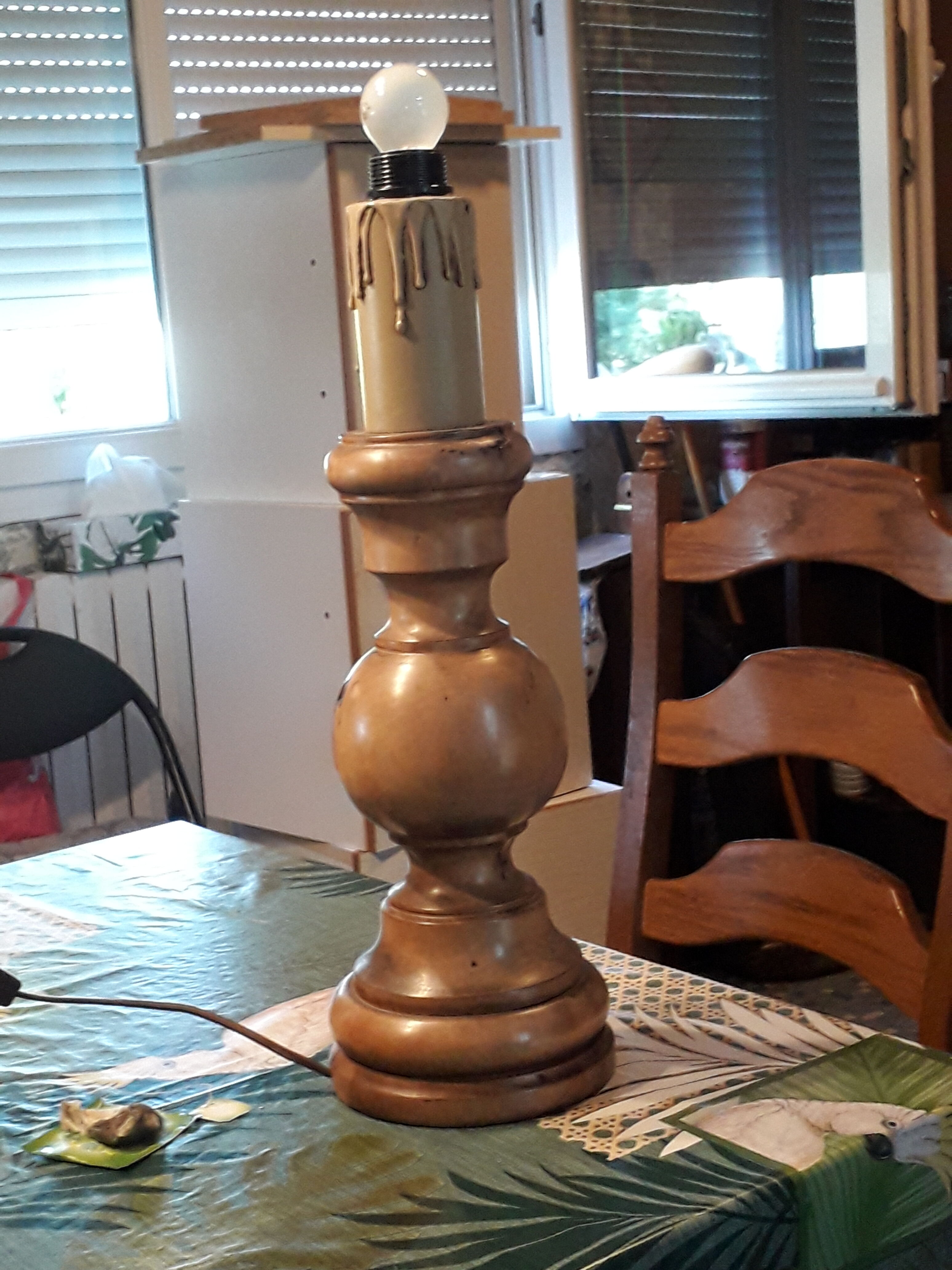 Turned wood table lamp with “skin” shade