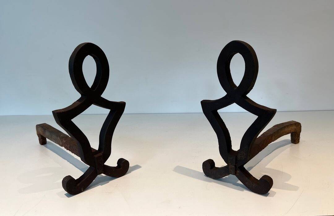 Pair of Modernist Andirons in Cast Iron with Stylised Figure Supports, by Ray