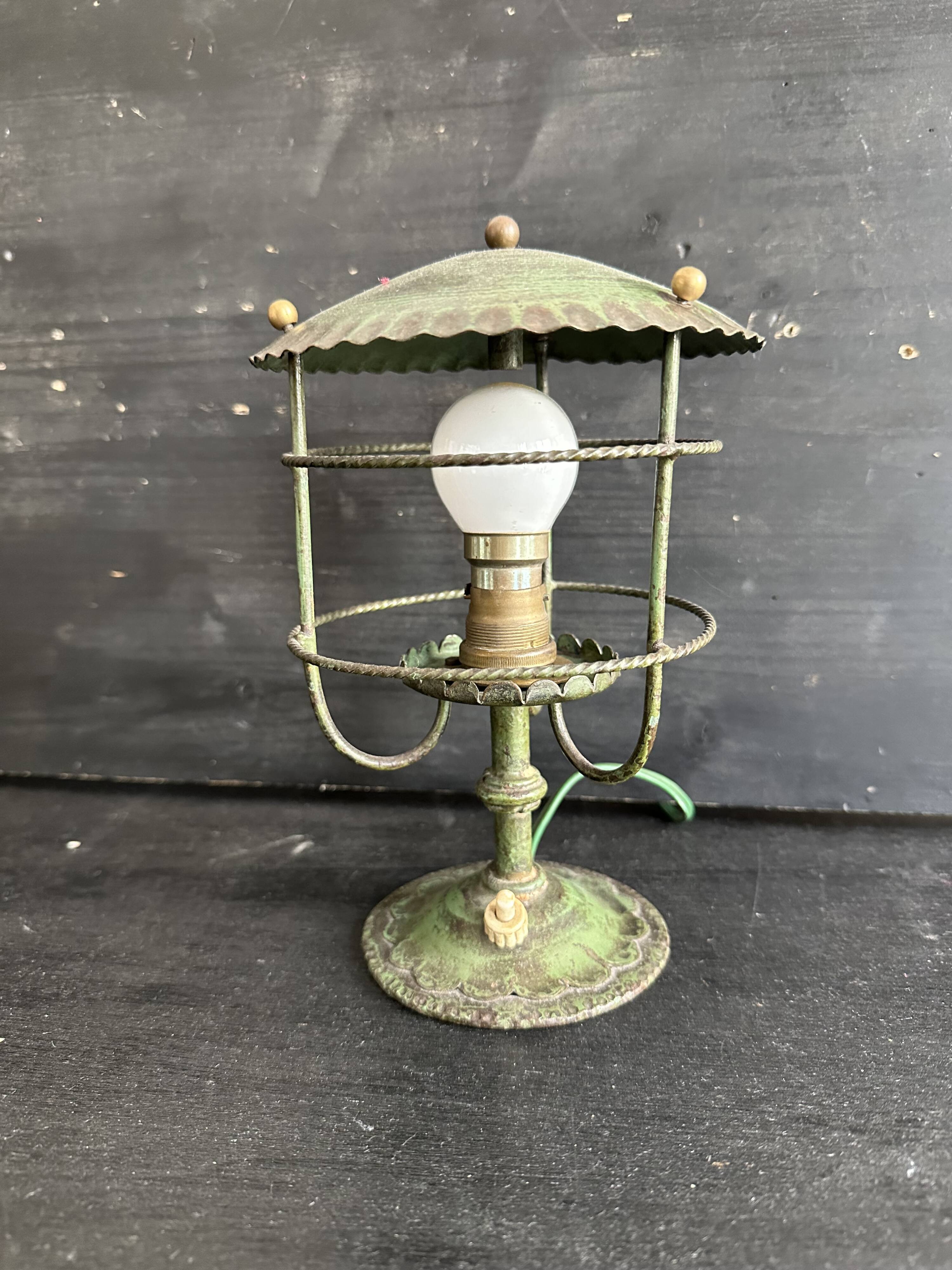 Antique patinated green metal lamp, Art Nouveau style, early 20th century.