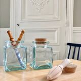 Pair of square jars in tinted glass and corks