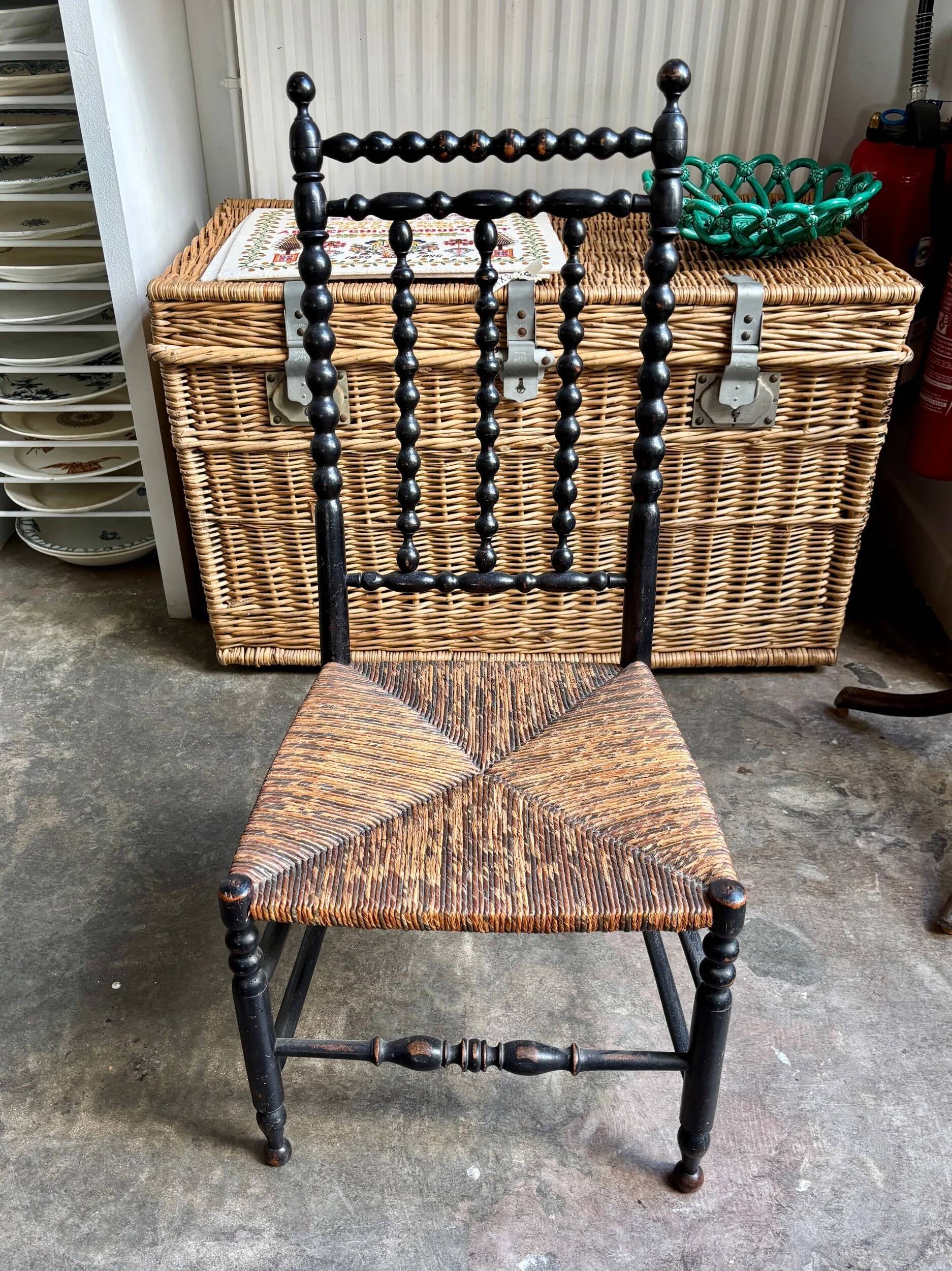Low chair, Napoléon III child in blackened wood and woven straw.