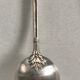 12 teaspoons silver metal