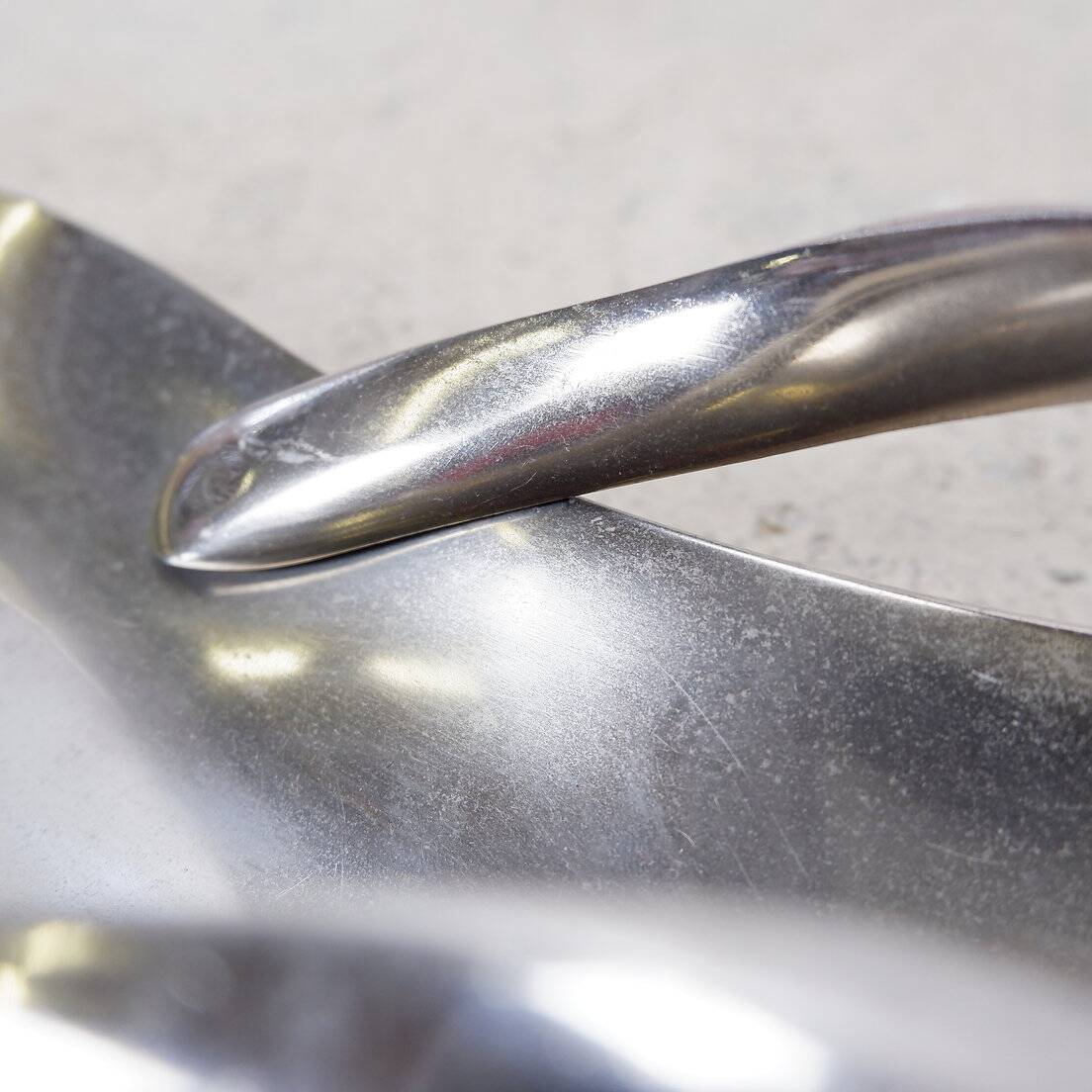 Aluminum pocket emptier flip flop