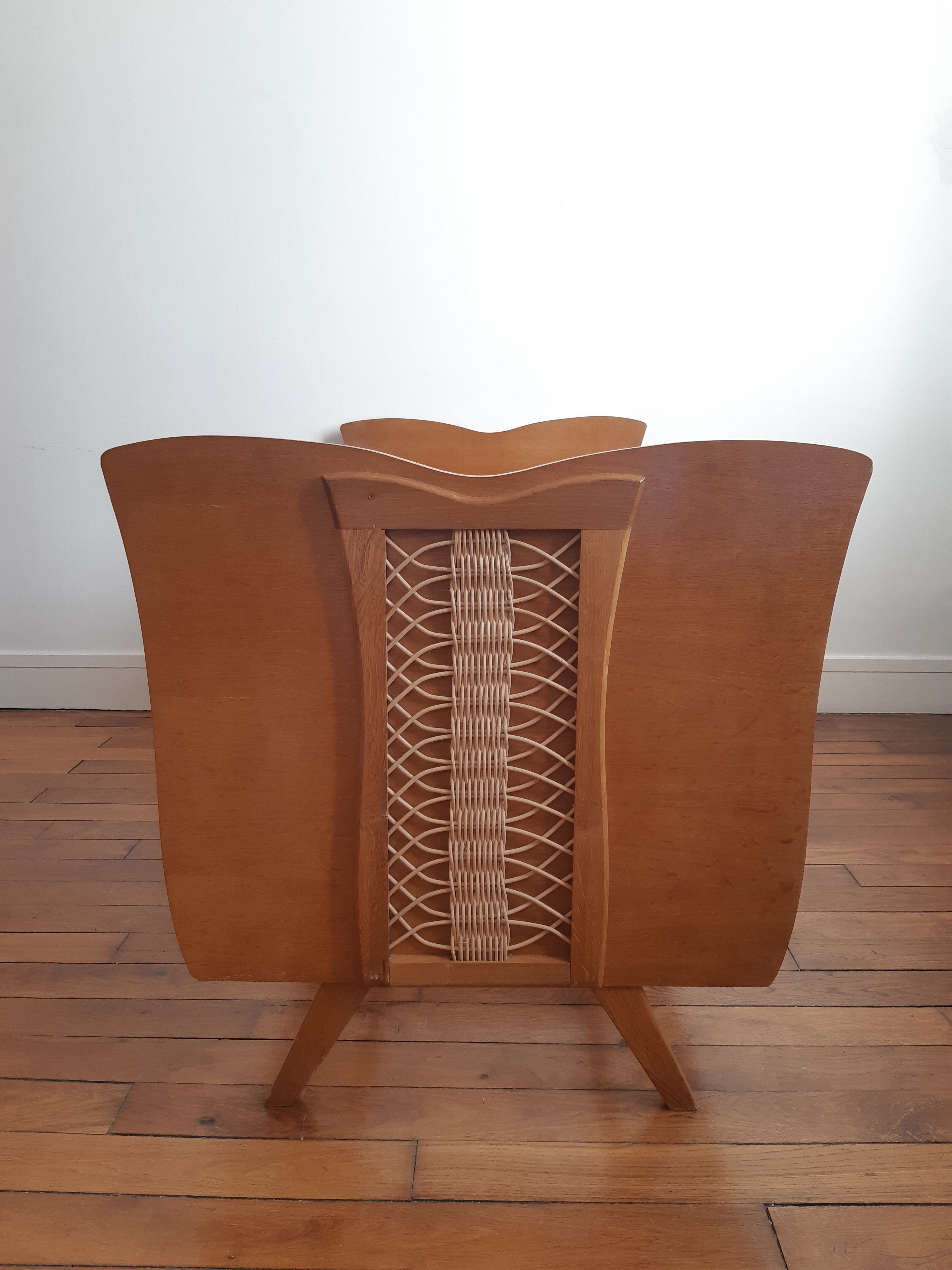 Wooden bed and vintage rattan