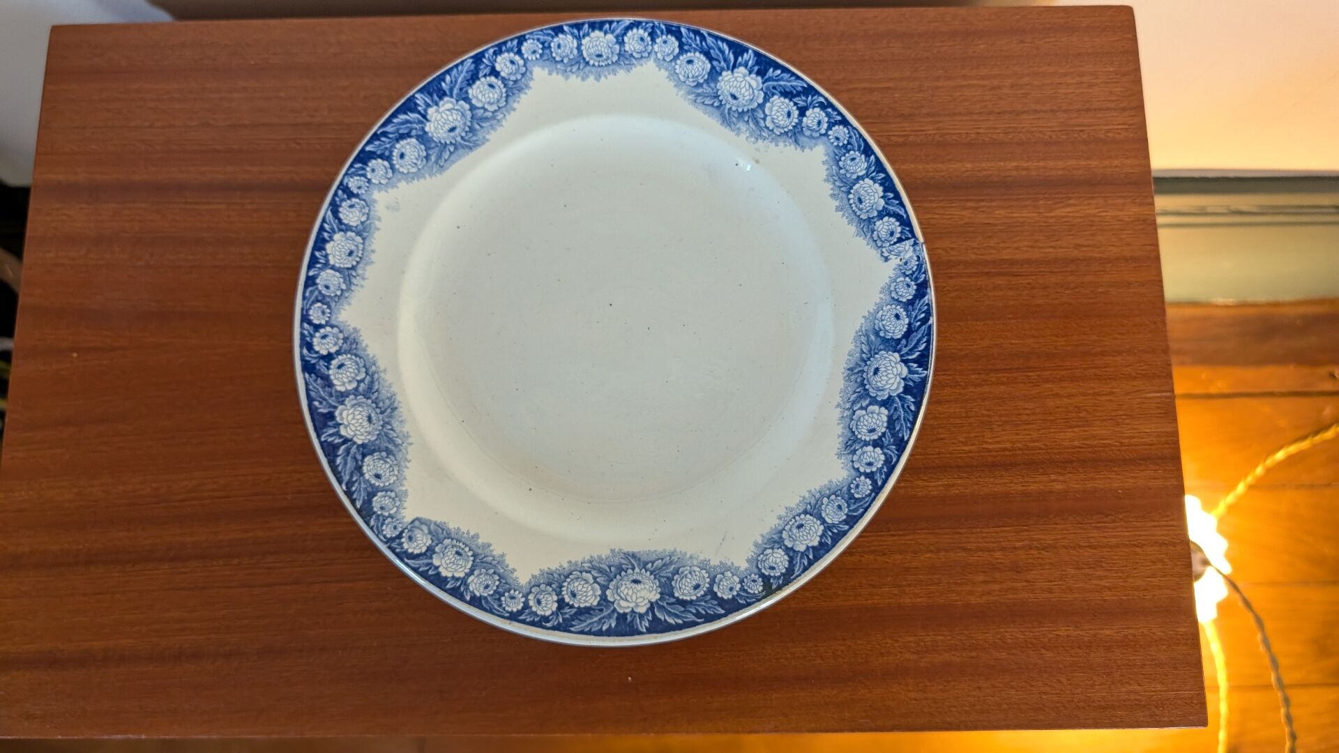 Antique compote dish with blue floral decoration.