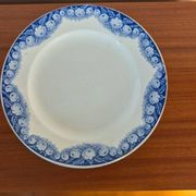 Antique compote dish with blue floral decoration.