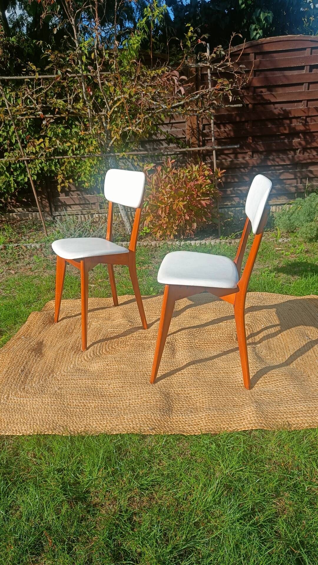 vintage wooden chairs with white faux leather