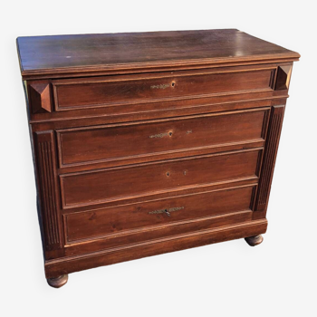 Solid wood chest of drawers with sculpture