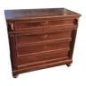 Solid wood chest of drawers with sculpture