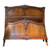 Lit corbeille  noyer sculpté de style Louis XVI