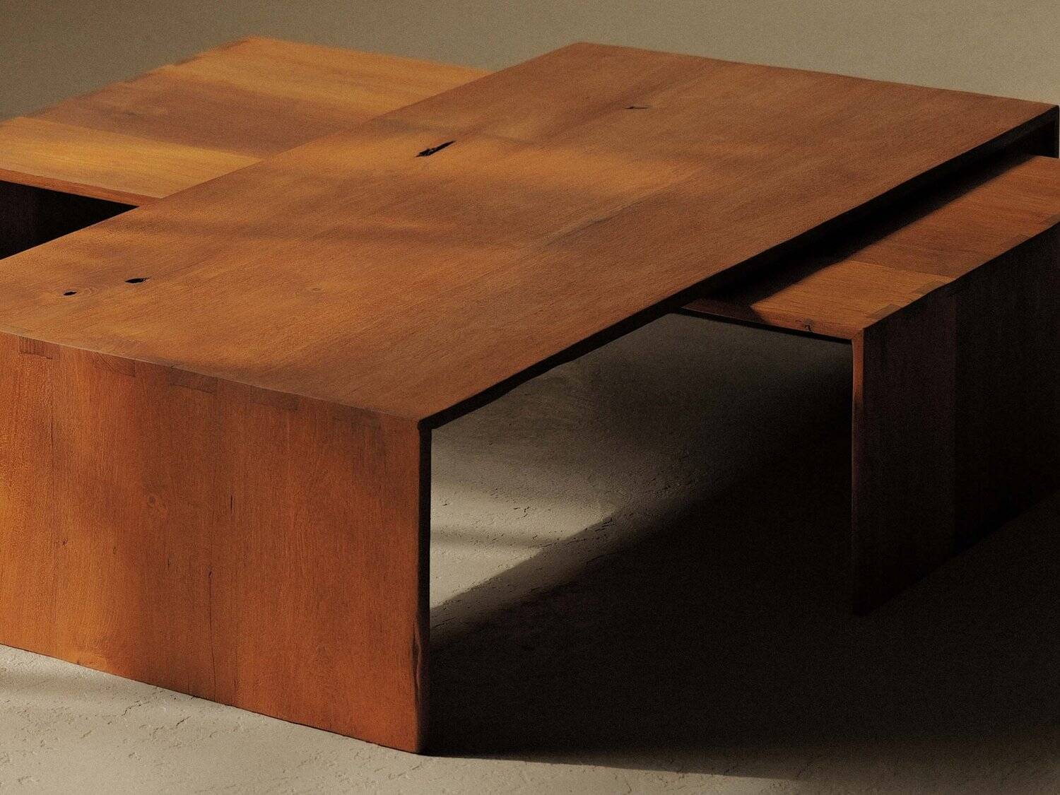 Pair of nesting coffee tables in solid wood, around 1980.