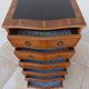 Louis XVI style chest of drawers in wood and cherry veneer.