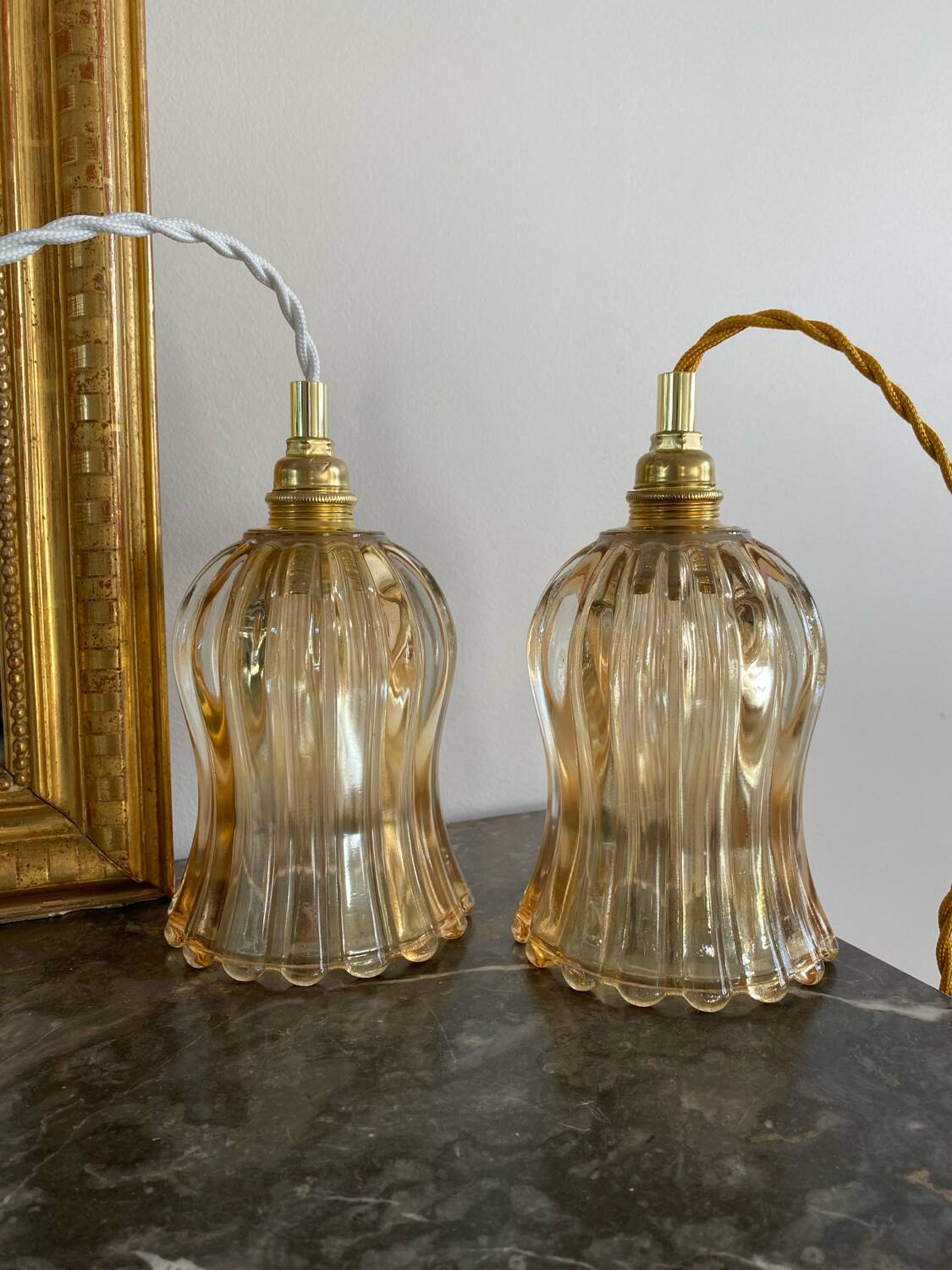 Pair of portable lamps with vintage amber glass globes