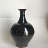 Black bottle of Jean Linard the terminal vintage sandstone