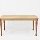 Vintage solid oak table with antique legs.