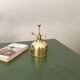 Vintage vaporizer in golden brass 70s
