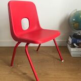 Red child chair by robin day for ikea