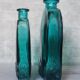 Blue engraved glass bottles