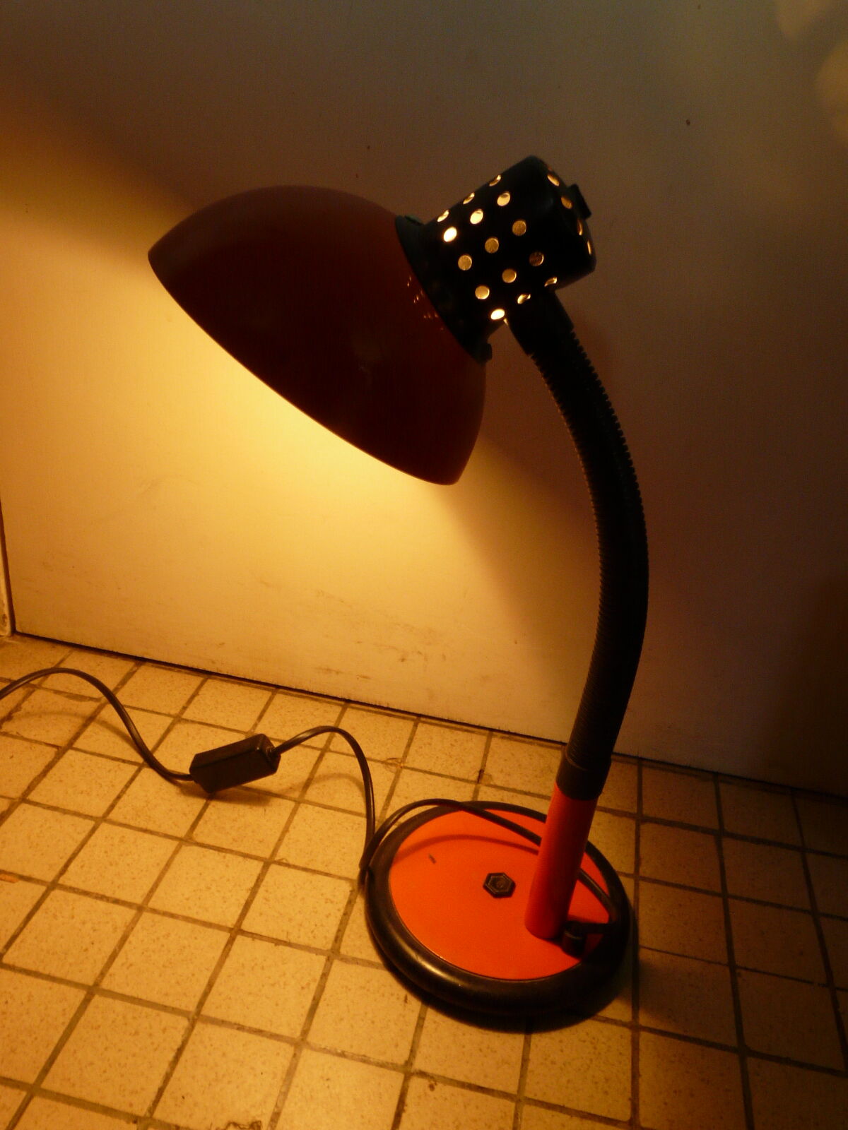 Orange and black arm metal table lamp flexible