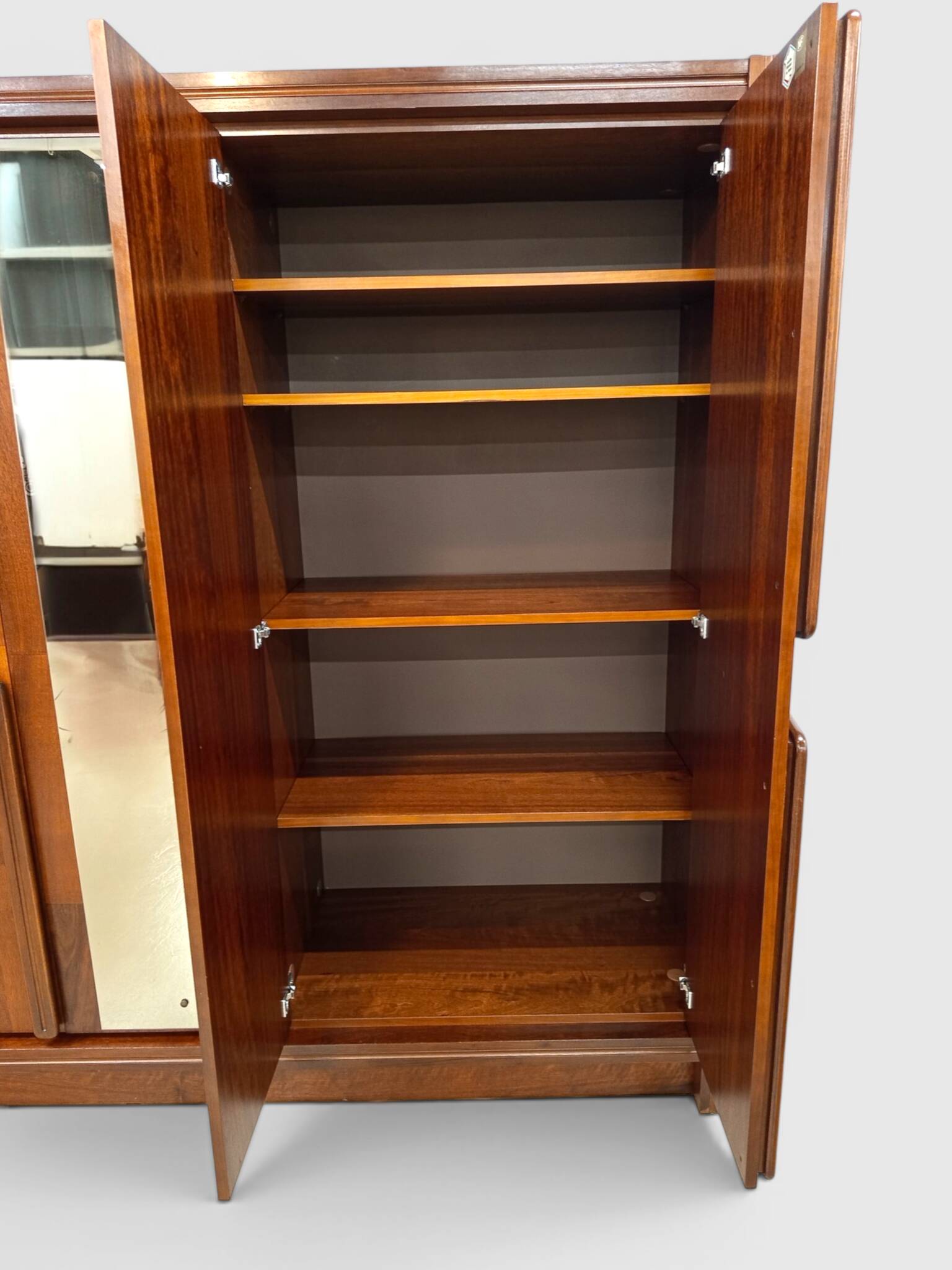 Modernist mahogany wardrobe with smoked mirrors (late 1970s)