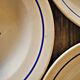 Vintage deep plates in ADP earthenware, blue rose patterns.