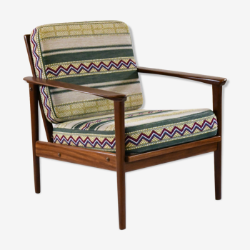 Vintage teak armchair covered with Pierre Frey fabric