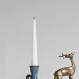 Antique candle holder in glazed ceramic