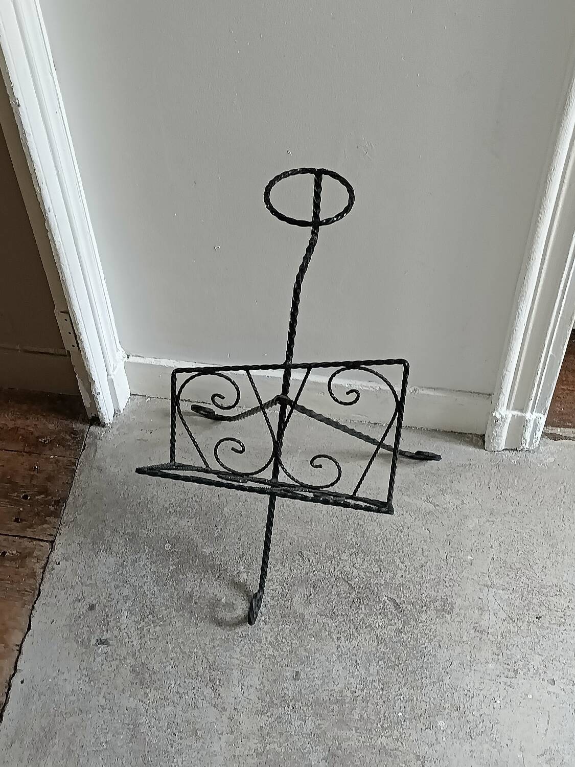 Vintage wrought iron magazine rack