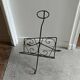 Vintage wrought iron magazine rack