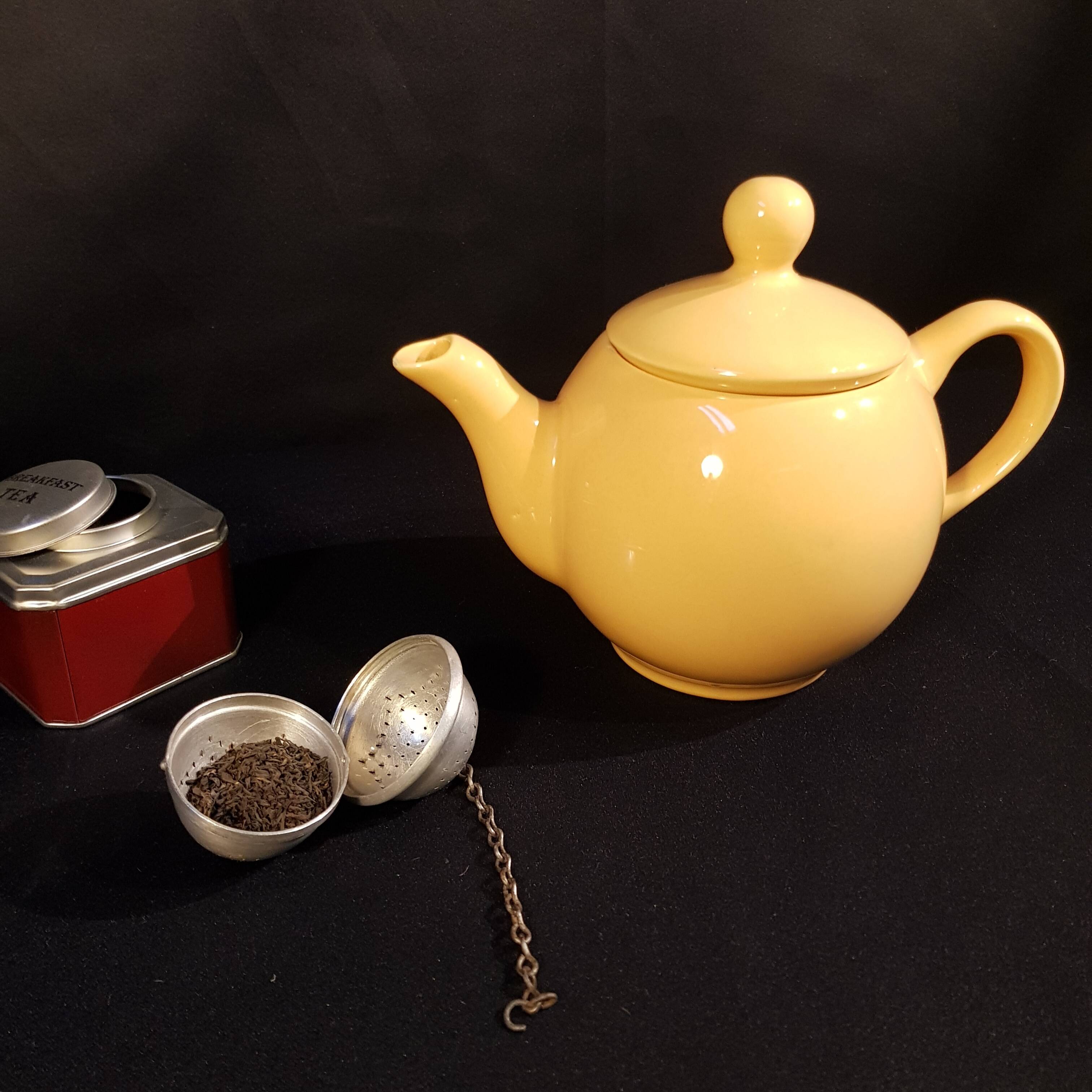 Yellow ceramic teapot