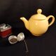 Yellow ceramic teapot