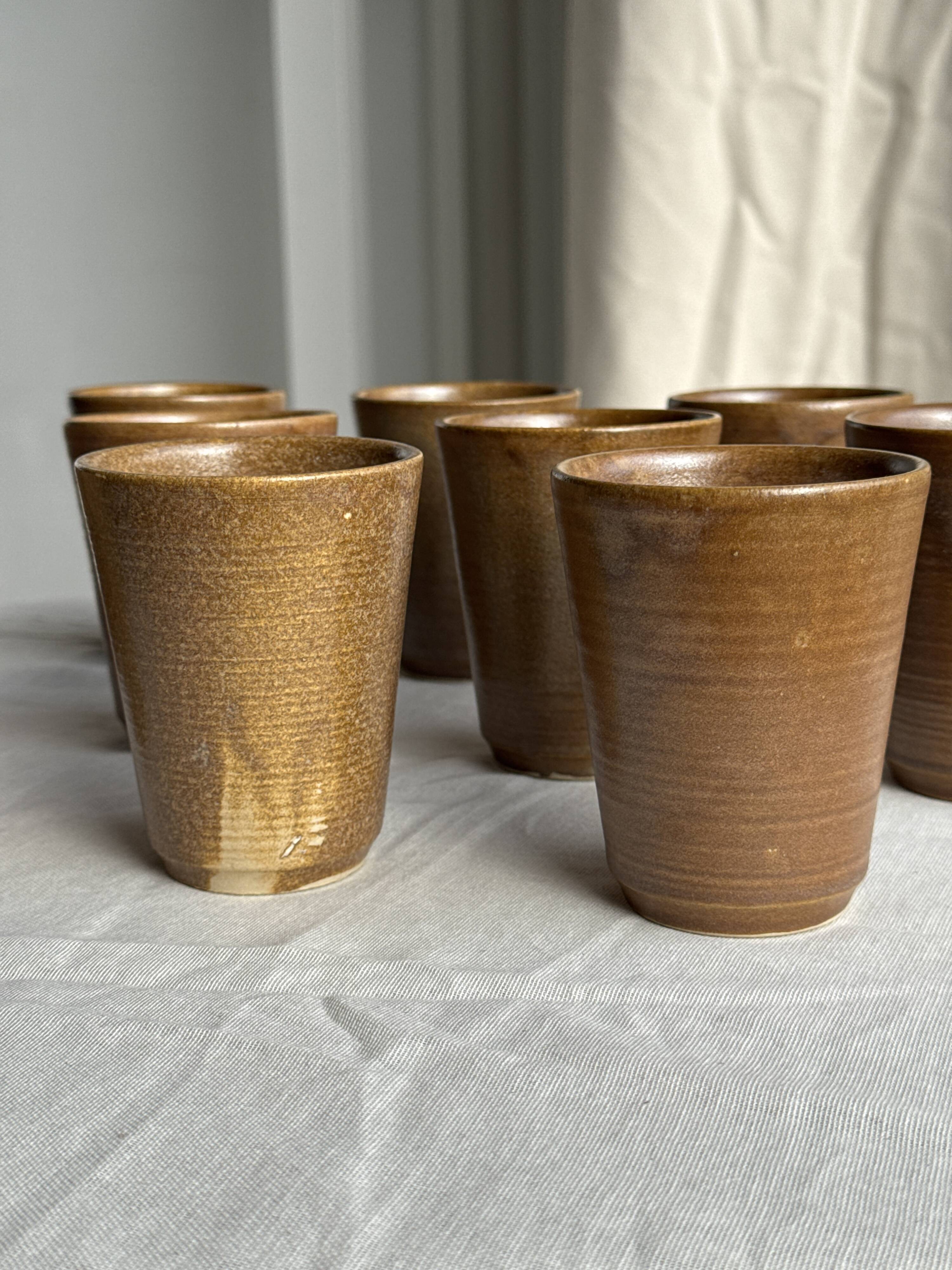 Set of 10 small stoneware mugs from Digoin.