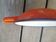Orange enamelled sheet metal dish