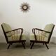 Set 2 old designer fireside chairs from the 50s wood and vintage fabric