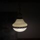 Suspension in white opaline glass and brass 1920 with a gilded brass chain.