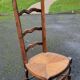 Chaise basse paillee dite chauffeuse