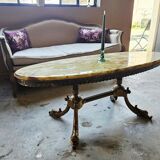 Oval coffee table in onyx and bronze – natural stone top – st