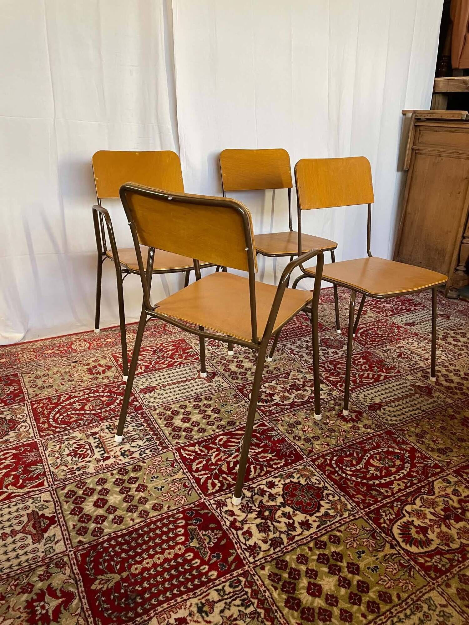 Set of 2 vintage school chairs and 2 armchairs.