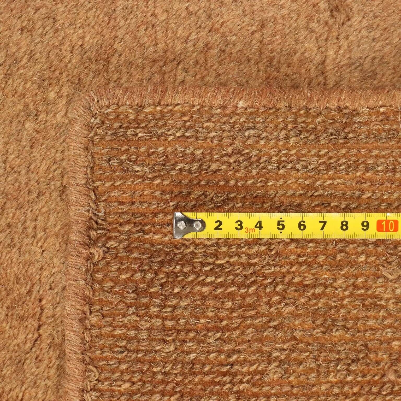 Ancient Asian wool rug, hand-knotted, 118 x 31 in.