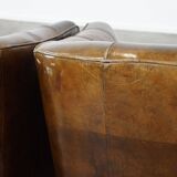 Set of 2 sturdy design armchairs made of cowhide with a beautiful deep color