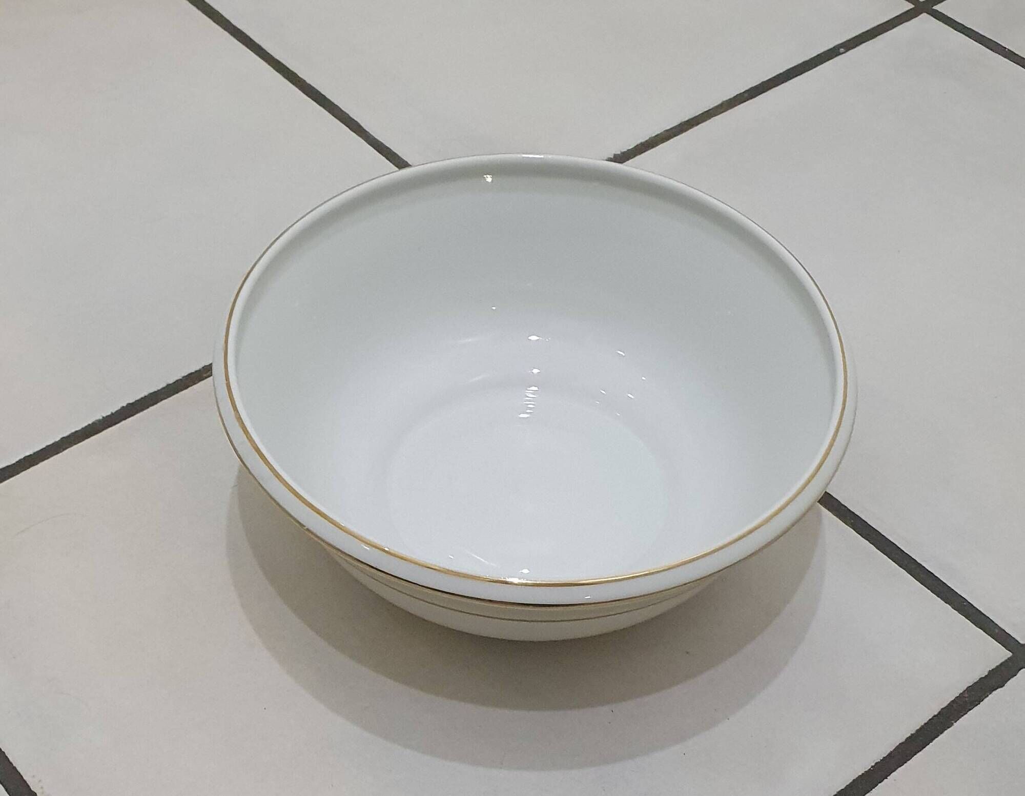 White and yellow porcelain dinner service with gold edging, Poral Limoges France