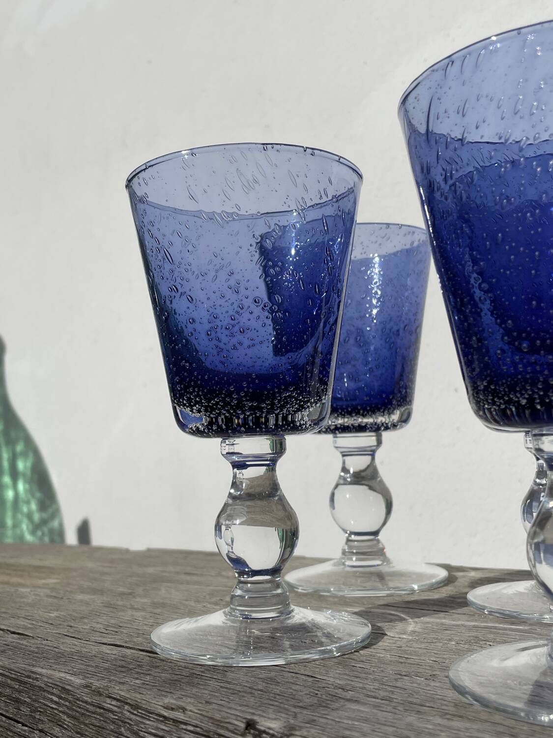 Set of 5 blue bubble stemmed glasses