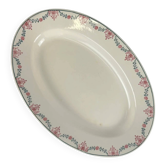 Oval plate Longwy, garland motif in pink and green, early 20th century.